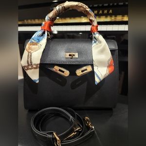 Kelly style top handle bag